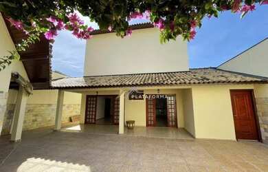 Imagem: A casa possui 3 Dormitórios, 4 Banheiros, 3 Vagas na garagem