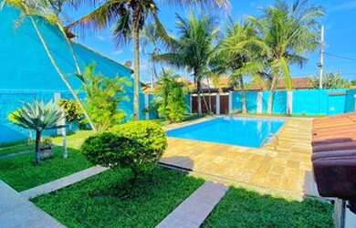 Imagem: A casa possui 3 Dormitórios e 4 Vagas na garagem e está localizado