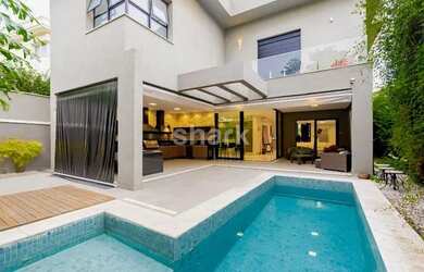 Imagem: A casa em condomínio possui 4 Dormitórios, 5 Banheiros, 4