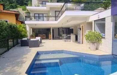 Imagem: A casa em condomínio possui 5 Dormitórios, 4 Banheiros, 2