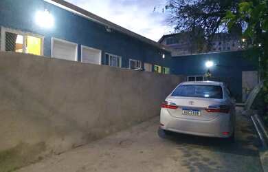 Imagem: A casa possui 5 Dormitórios, 5 Banheiros, 5 Vagas na garagem