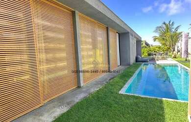 Imagem: A casa em condomínio possui 4 Dormitórios, 5 Banheiros, 3