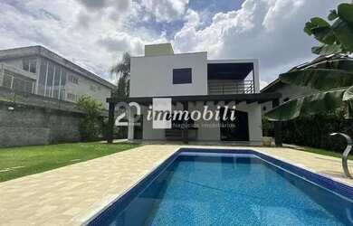 Imagem: A casa em condomínio possui 4 Dormitórios, 5 Banheiros, 5