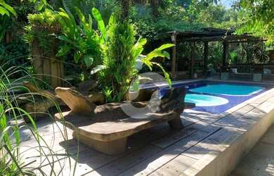 Imagem: A casa em condomínio possui 4 Dormitórios, 4 Banheiros, 2