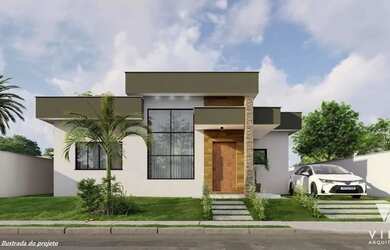 Imagem: A casa possui 3 Dormitórios, 1 Banheiro, 2 Vagas na garagem