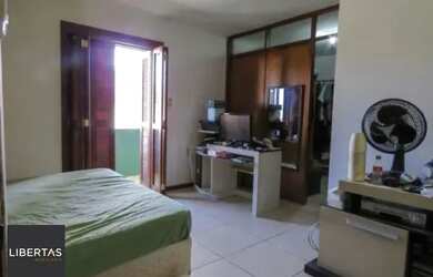 Imagem: A casa possui 4 Dormitórios, 4 Banheiros, 1 Vaga na garagem