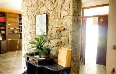 Imagem: A casa possui 4 Dormitórios, 4 Banheiros, 2 Vagas na garagem