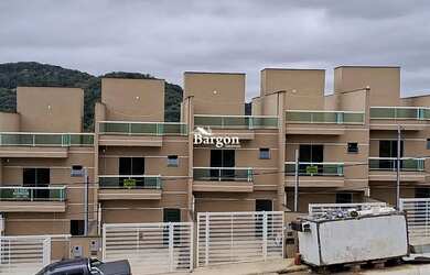 Imagem: A casa possui 2 Dormitórios, 2 Banheiros, 2 Vagas na garagem