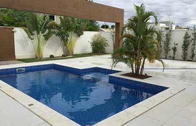 Imagem: A casa em condomínio possui 4 Dormitórios, 5 Banheiros, 4