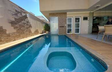 Imagem: A casa em condomínio possui 4 Dormitórios, 5 Banheiros, 5