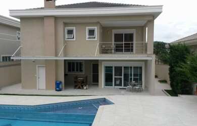 Imagem: A casa em condomínio possui 4 Dormitórios, 5 Banheiros, 4