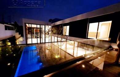 Imagem: A casa em condomínio possui 5 Dormitórios, 5 Banheiros, 5