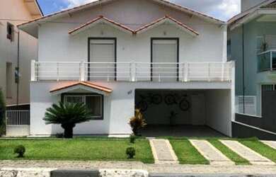 Imagem: A casa em condomínio possui 4 Dormitórios, 4 Banheiros, 4