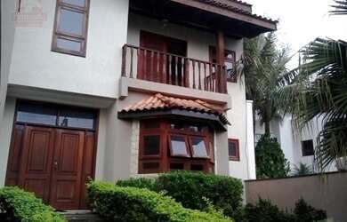 Imagem: A casa possui 4 Dormitórios, 1 Banheiro, 4 Vagas na garagem