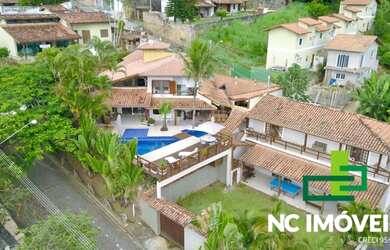 Imagem: A casa possui 5 Dormitórios, 5 Banheiros, 450m² de Área