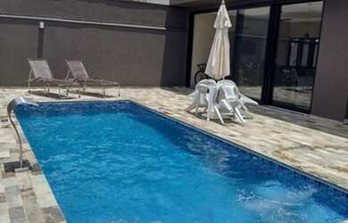 Imagem: A casa em condomínio possui 3 Dormitórios, 5 Banheiros, 4