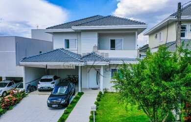 Imagem: A casa em condomínio possui 4 Dormitórios, 5 Banheiros, 2