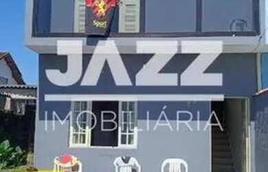 Imagem: A casa possui 2 Dormitórios, 3 Banheiros, 4 Vagas na garagem