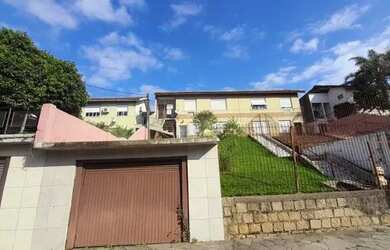 Imagem: A casa possui 2 Dormitórios, 1 Banheiro, 61m² de Área, Churrasqueira