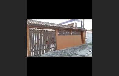 Imagem: A casae possui 4 Dormitórios, 4 Vagas na garagem está localizado