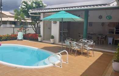 Imagem: A casa em condomínio possui 5 Dormitórios, 5 Banheiros, 2