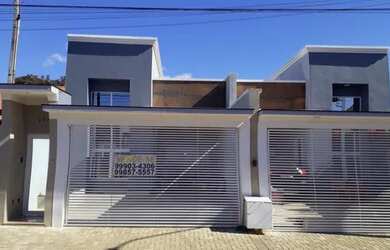 Imagem: A casa possui 3 Dormitórios, 2 Banheiros, 2 Vagas na garagem