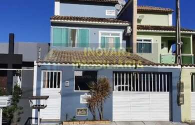 Imagem: A casa possui 3 Dormitórios, 3 Banheiros, 3 Vagas na garagem