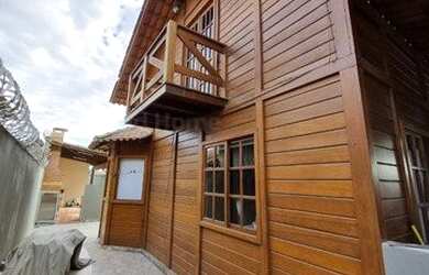 Imagem: A casa possui 4 Dormitórios, 3 Banheiros, 4 Vagas na garagem