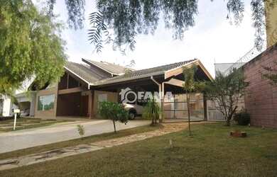 Imagem: A casa em condomínio possui 3 Dormitórios, 4 Banheiros, 2