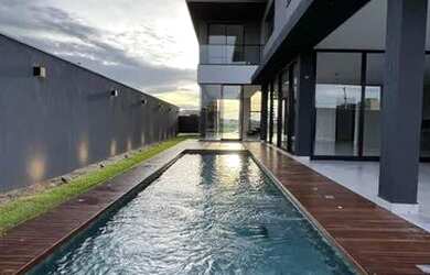 Imagem 16: Casa de condomínio para venda possui 357 metros quadrados com 5 quartos