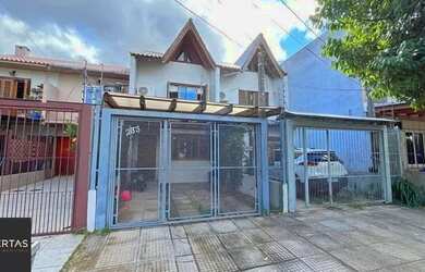 Imagem: A casa possui 2 Dormitórios, 2 Banheiros, 1 Vaga na garagem