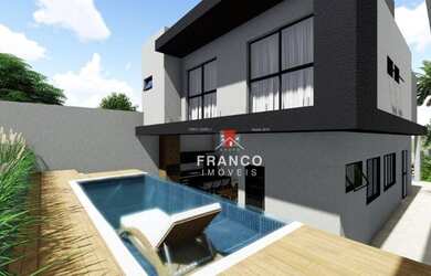 Imagem: A casa possui 3 Dormitórios, 3 Banheiros, 4 Vagas na garagem