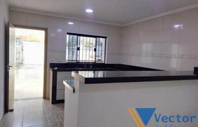 Imagem: A casa possui 3 Dormitórios, 2 Banheiros, 3 Vagas na garagem