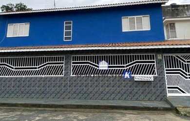 Imagem: A casa possui 3 Dormitórios, 5 Banheiros, 4 Vagas na garagem