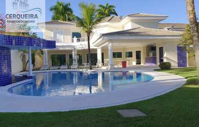 Imagem: A casa possui 5 Dormitórios, 5 Banheiros, 4 Vagas na garagem