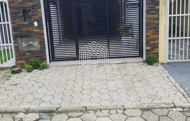 Imagem: A casa possui 2 Dormitórios, 1 Banheiro, 1 Vaga na garagem