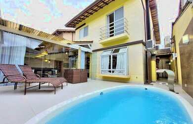 Imagem: A casa possui 3 Dormitórios, 4 Banheiros, 4 Vagas na garagem