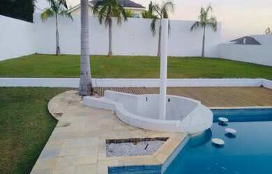 Imagem: A casa em condomínio possui 4 Dormitórios, 5 Banheiros, 5