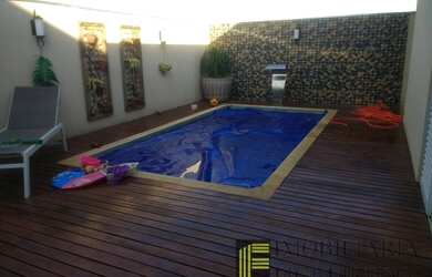 Imagem: A casa em condomínio possui 4 Dormitórios, 1 Banheiro, 4 Vagas