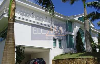 Imagem: A casa em condomínio possui 4 Dormitórios, 5 Banheiros, 5