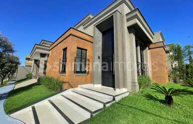 Imagem: A casa em condomínio possui 3 Dormitórios, 4 Banheiros, 4