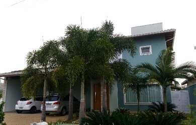 Imagem: A casa possui 3 Dormitórios, 5 Banheiros, 5 Vagas na garagem