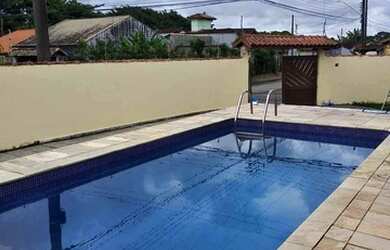 Imagem: A casa possui 3 Dormitórios, 2 Banheiros, 3 Vagas na garagem