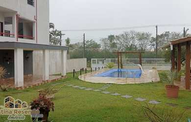 Imagem: A casa em condomínio possui 2 Dormitórios, 3 Banheiros, 3