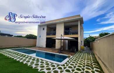 Imagem: A casa possui 4 Dormitórios, 4 Banheiros, 3 Vagas na garagem