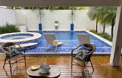 Imagem: A casa possui 5 Dormitórios, 5 Banheiros, 2 Vagas na garagem