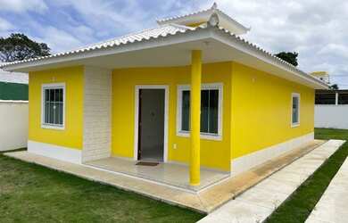 Imagem: A casa possui 3 Dormitórios, 2 Banheiros, 3 Vagas na garagem