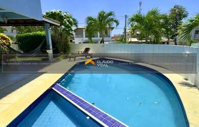 Imagem: A casa possui 5 Dormitórios, 5 Banheiros, 2 Vagas na garagem