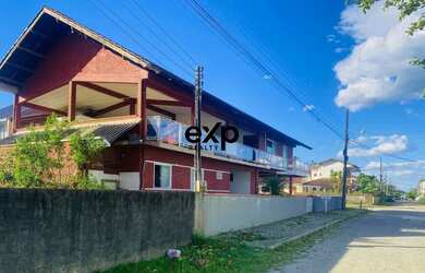 Imagem: A casa possui 5 Dormitórios, 5 Banheiros, 5 Vagas na garagem