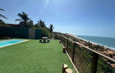 Imagem: A casa possui 4 Dormitórios, 5 Banheiros, 3 Vagas na garagem